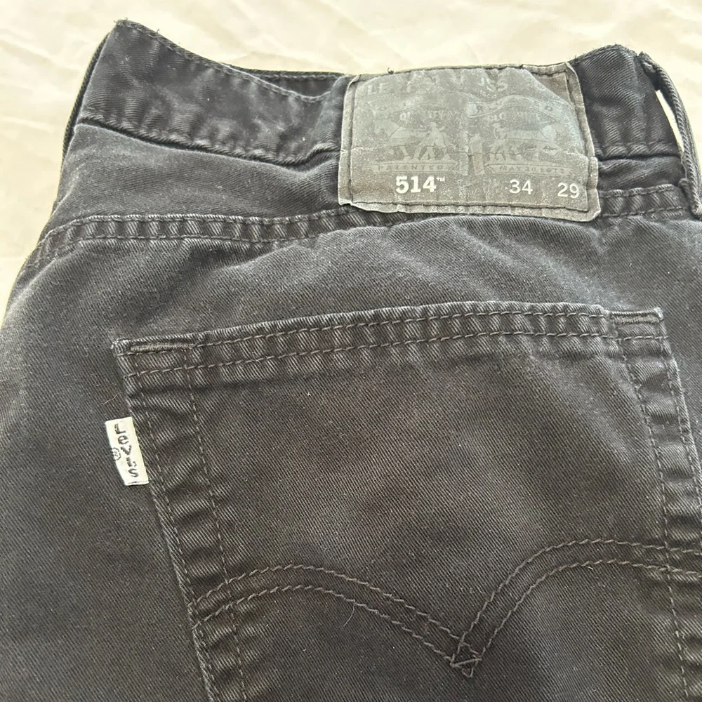 Levi’s 514 Faded Black Denim Jeans size 34x29